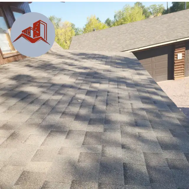 Overhead view of an architectural asphalt shingle roof in warm brown tones on a residential home